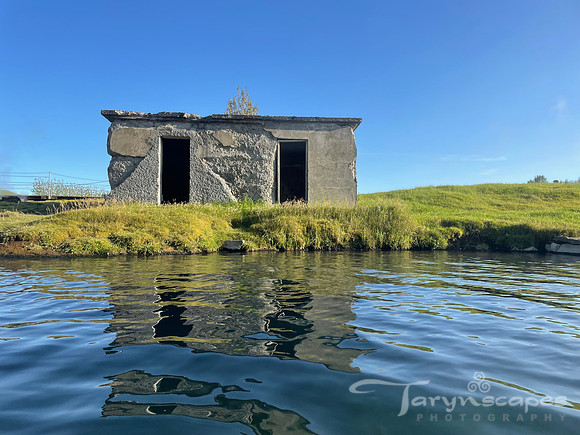 Old stone bathhouse on the shore of the hidden lagoon